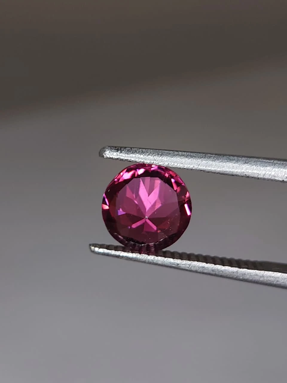 1.3ct Round Brilliant Faceted Malaya Garnet from Tanzania — view 6